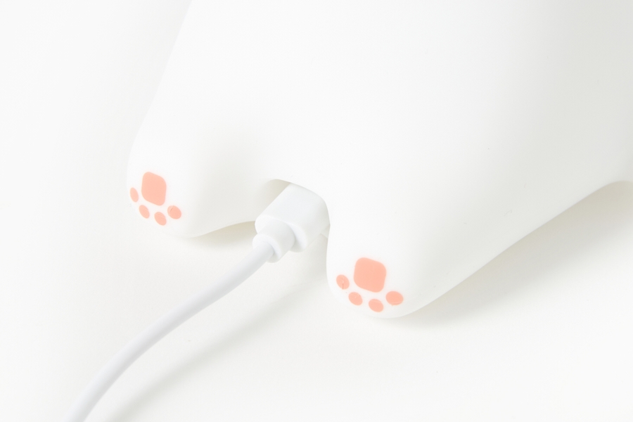 Artbox Soft Rabbit Silicone Mood Light charging with USB-C cable plugged into back