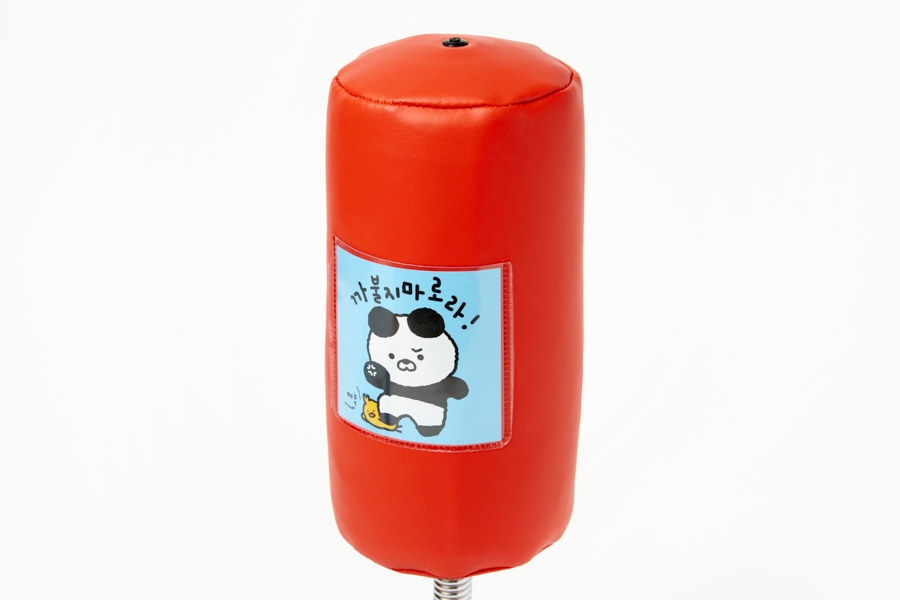 Artbox Stress Relief Punching Ball red faux leather bag close-up with panda sticker