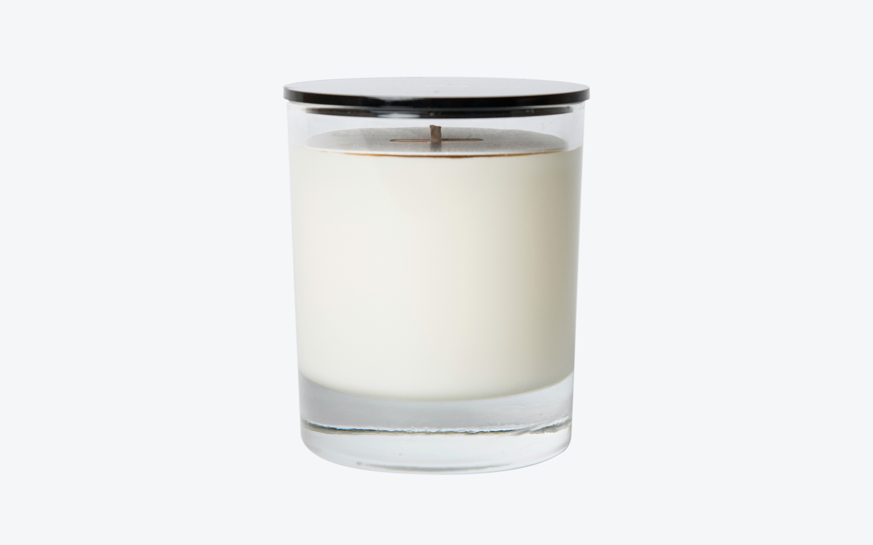COSMIC MANSION Linen & Musk No.11 candle glass jar and black lid without label side view