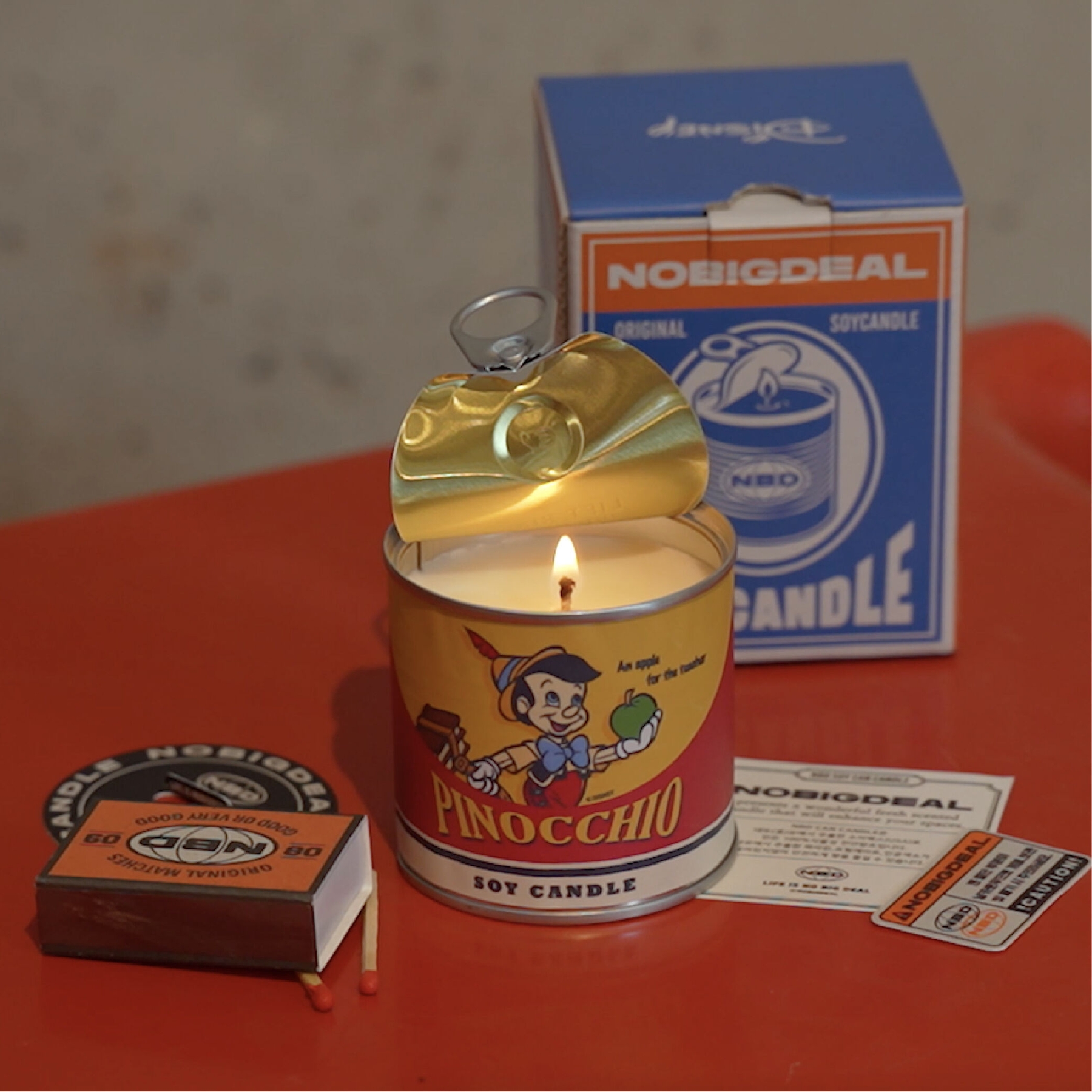 NOBIGDEAL Can Candle Pinocchio soy candle lit with pull-tab lid, box and matches