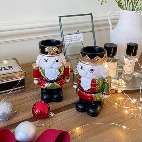 Maison de aloha Nutcracker Candle Holder pair styled with tabletop decor
