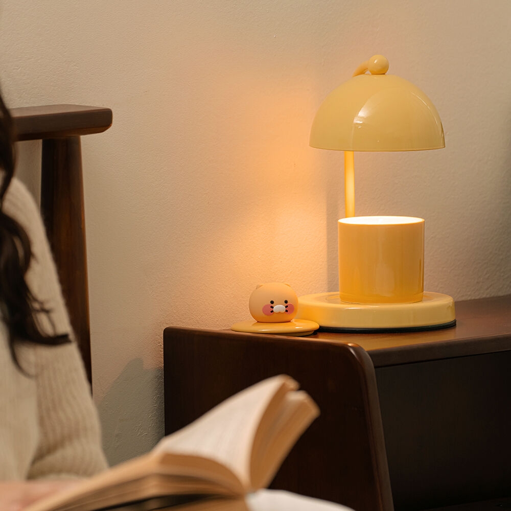 K-Lifestyle Kakao Friends Daily Candle Warmer Choonsik yellow lit as bedside lamp
