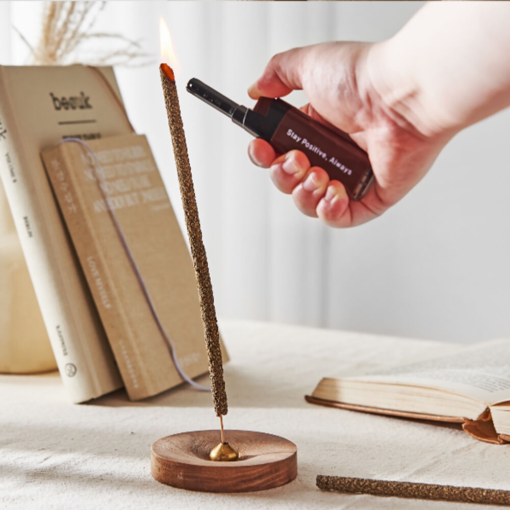 K-Lifestyle STAY POSITIVE Palo Santo Incense Lighter brown lighting incense stick in use