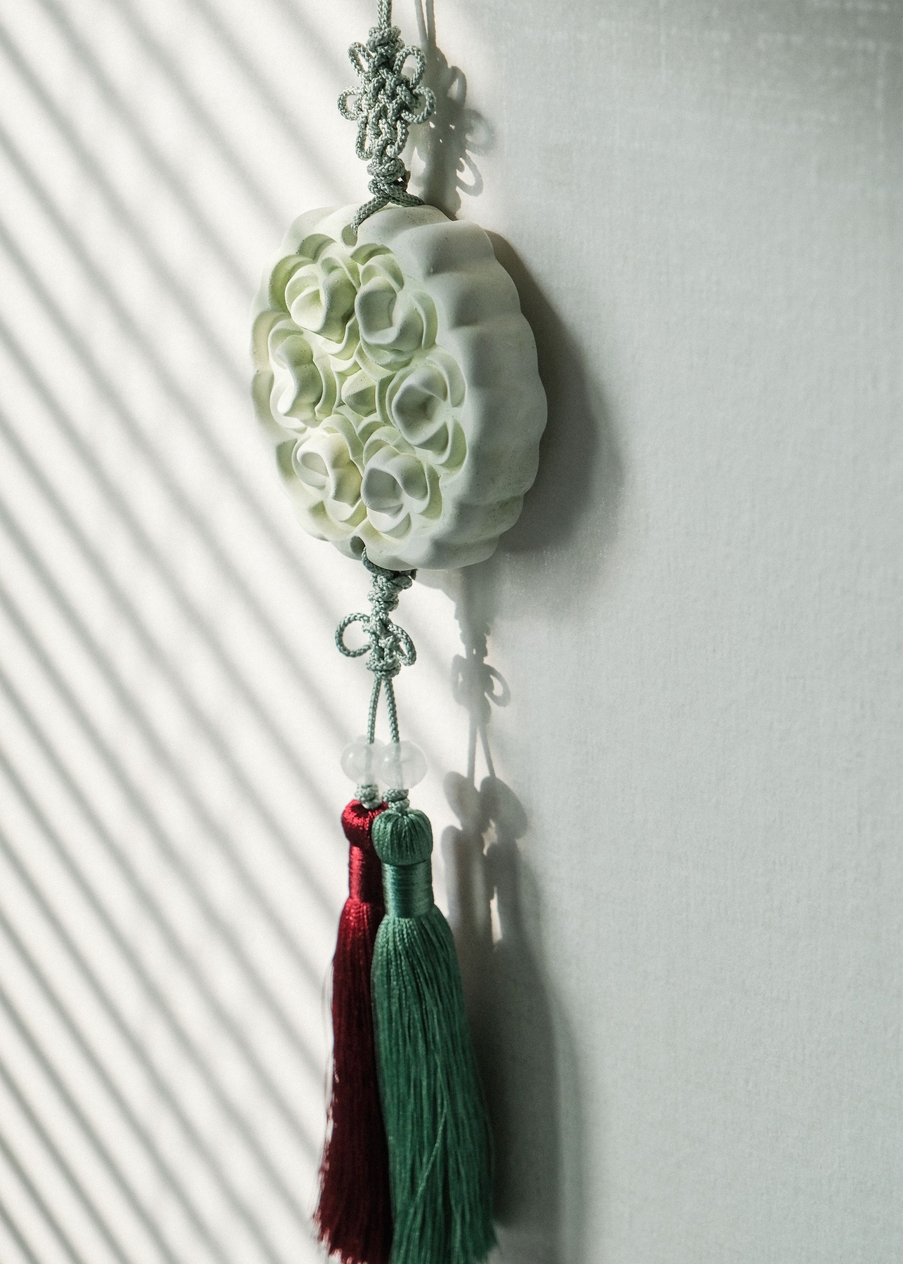 OUWR Hyang Norigae Cloud Flower P3-19 gypsum diffuser relief detail with red and green tassels
