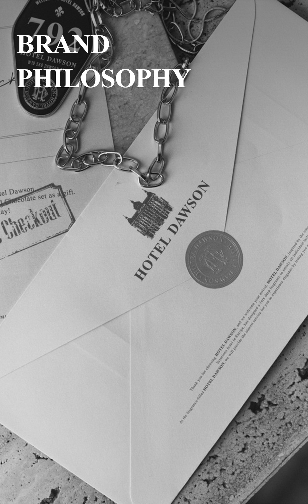 HOTEL DAWSON brand philosophy banner with sealed envelope and room key