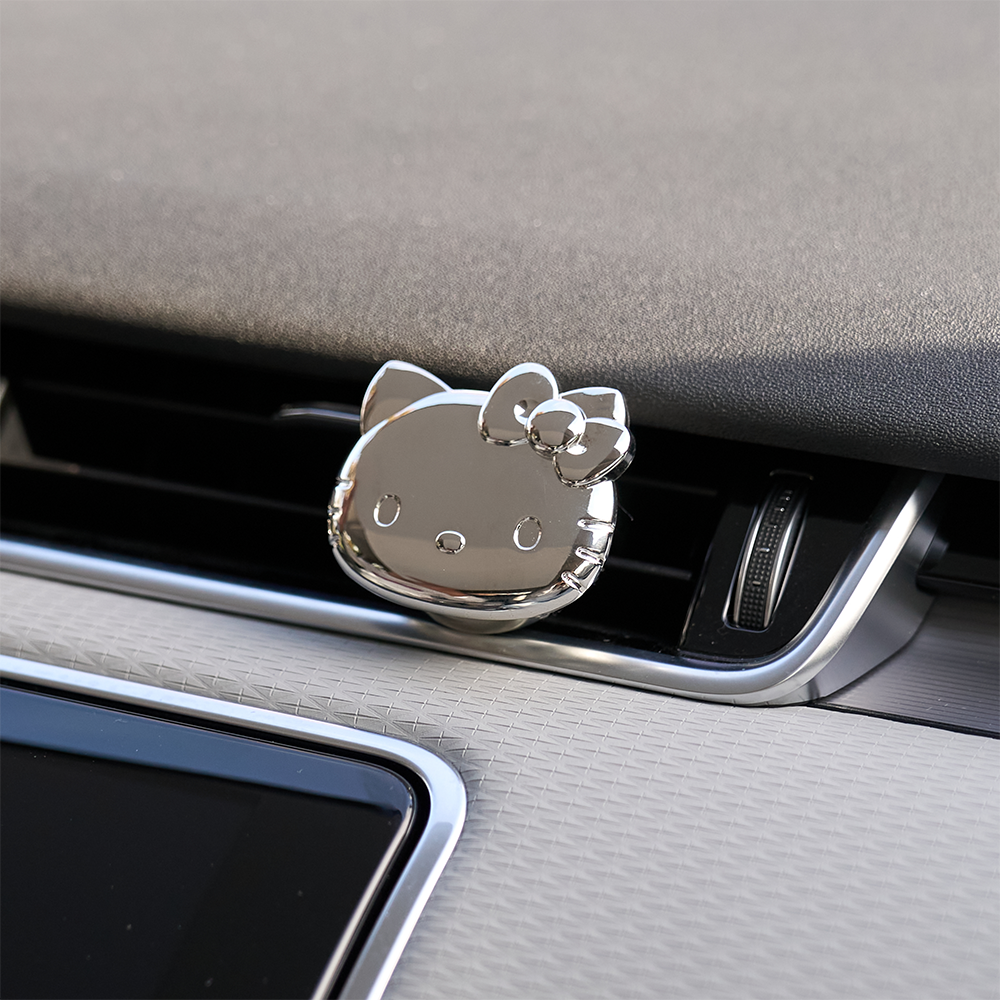 OHSCENT Hello Kitty Over Car Diffuser clipped on car air vent close-up