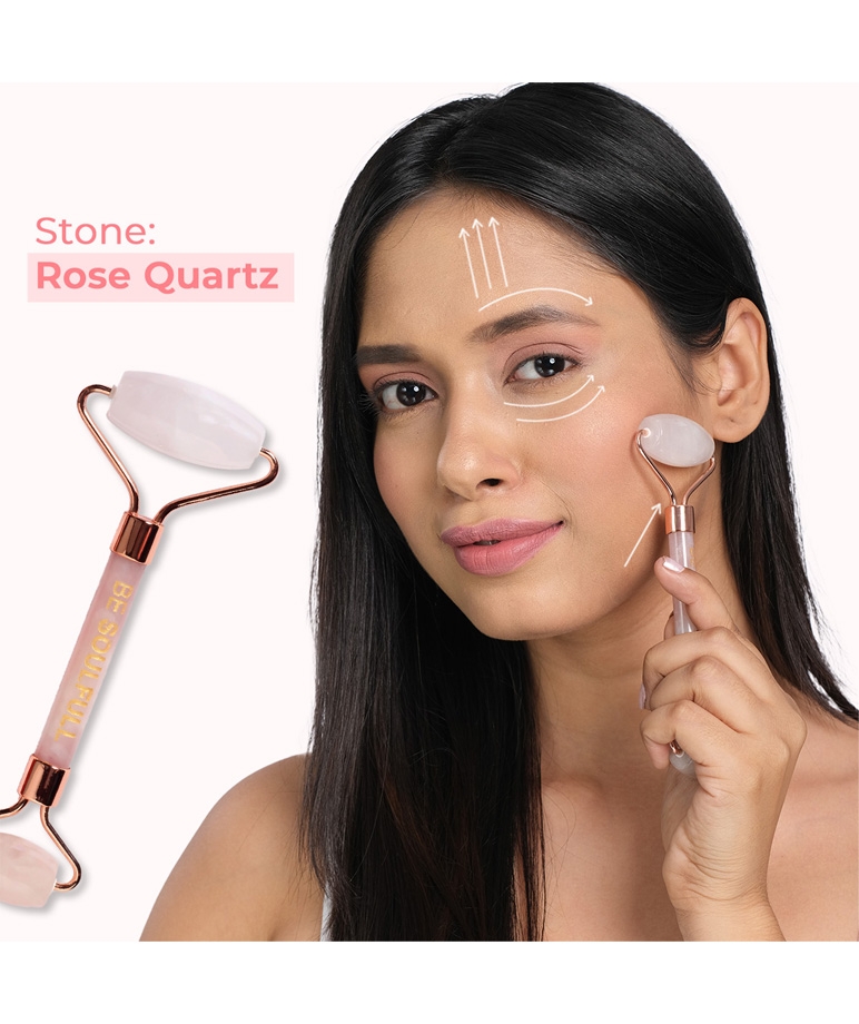 Be Soulfull Rose Quartz Face Roller on model with upward massage direction arrows