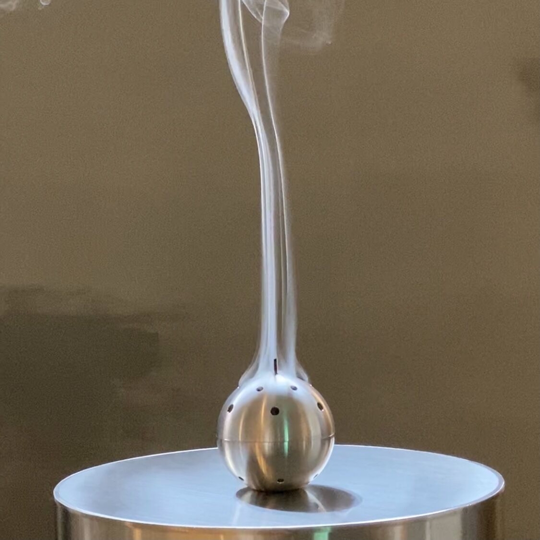 K-Lifestyle FE26 Incense Burner aluminium sphere with rising incense smoke