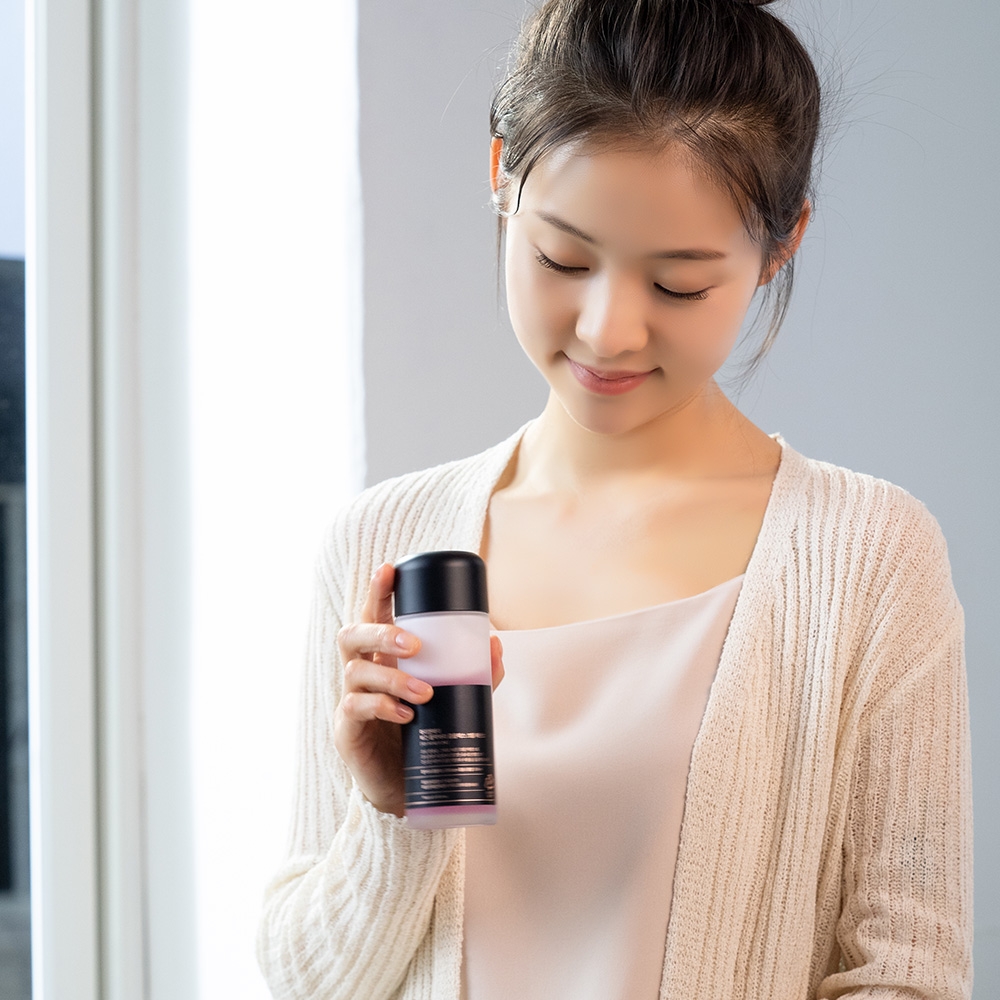 Mary&May Vegan Blackberry Complex Cream Essence 140ml on model, held for skincare routine