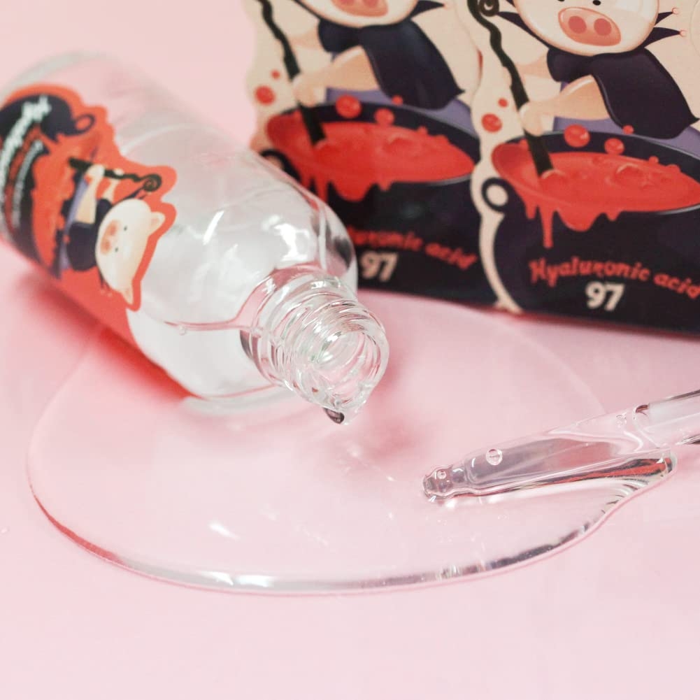 Elizavecca Witch Piggy Hell Pore Control Hyaluronic Acid 97 clear serum texture poured from bottle