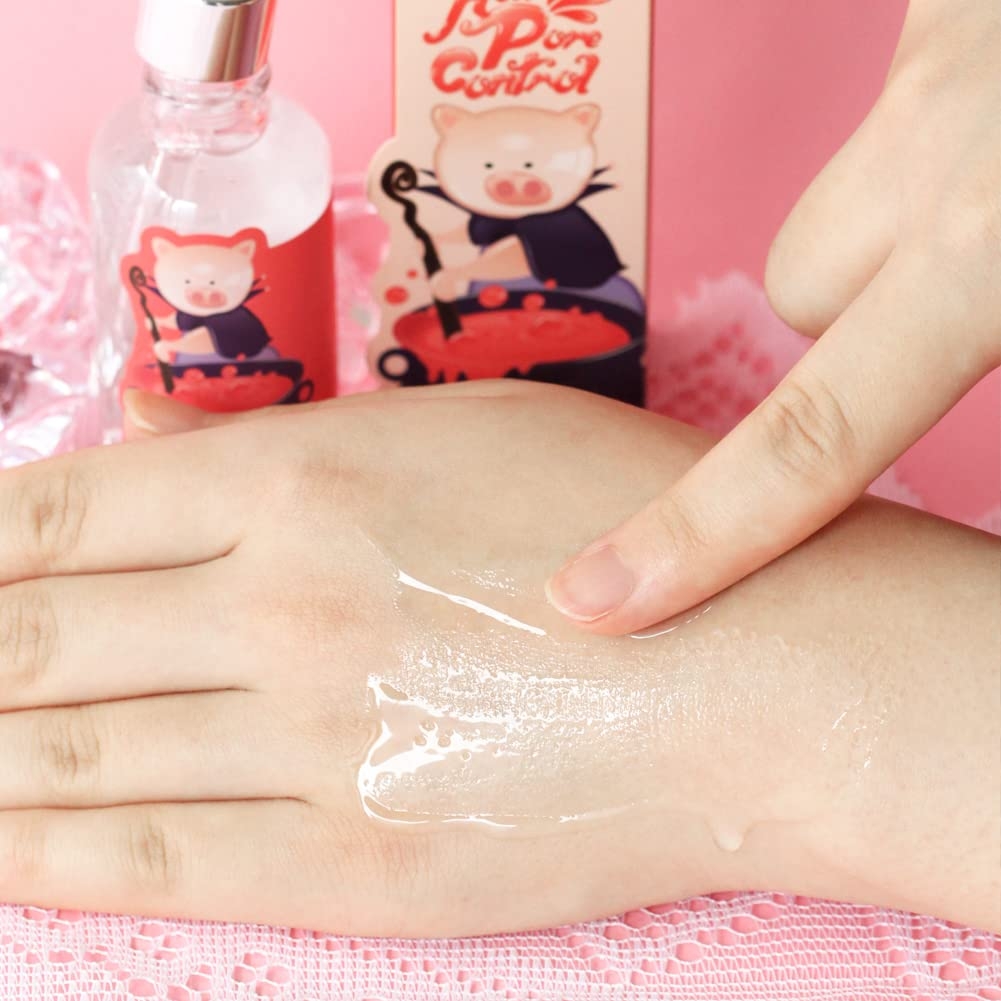 Elizavecca Witch Piggy Hell Pore Control Hyaluronic Acid 97 serum texture spread on back of hand