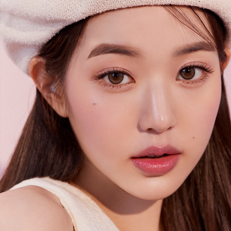 Hapakristin One and Only Kristin Monthly Brown color contact lenses on model, face view