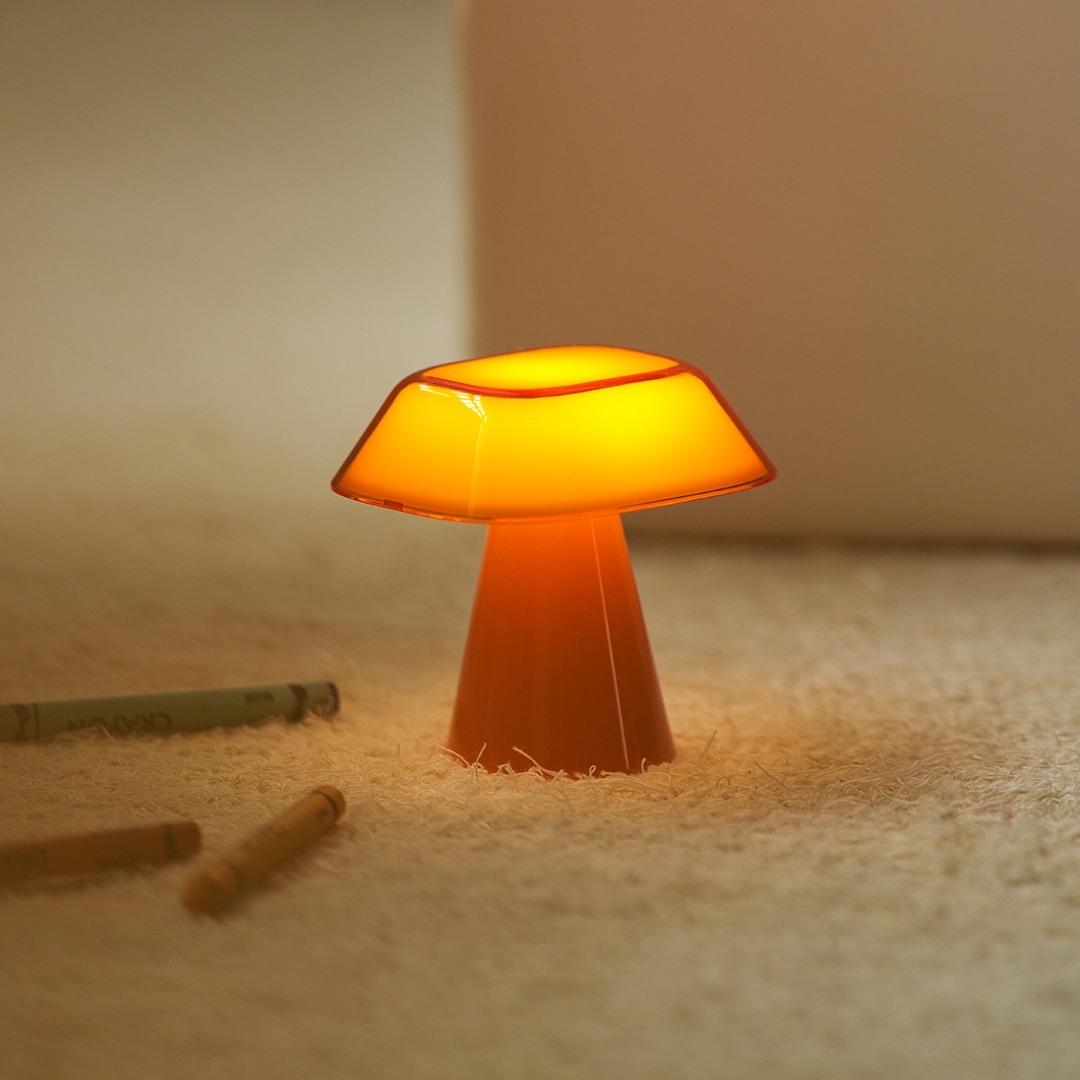 lumena SPACE S - ROOF Sun Orange mini mood lamp glowing as a night light