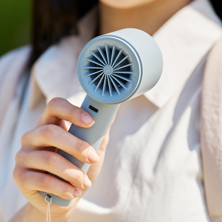 lumena FAN PRO JET Cream White handheld fan front view with LED indicator
