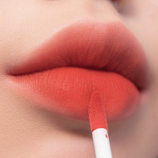 Rom&nd Zero Velvet Tint orange red lip swatch