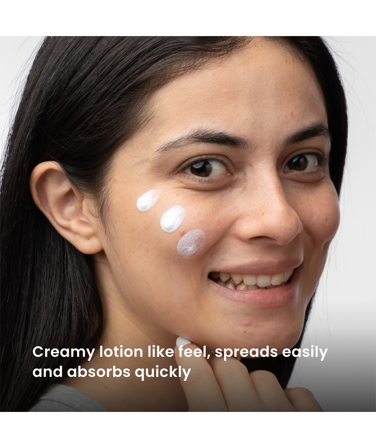 Re'equil O Free Sunscreen SPF 50 PA+++ creamy lotion texture on cheek