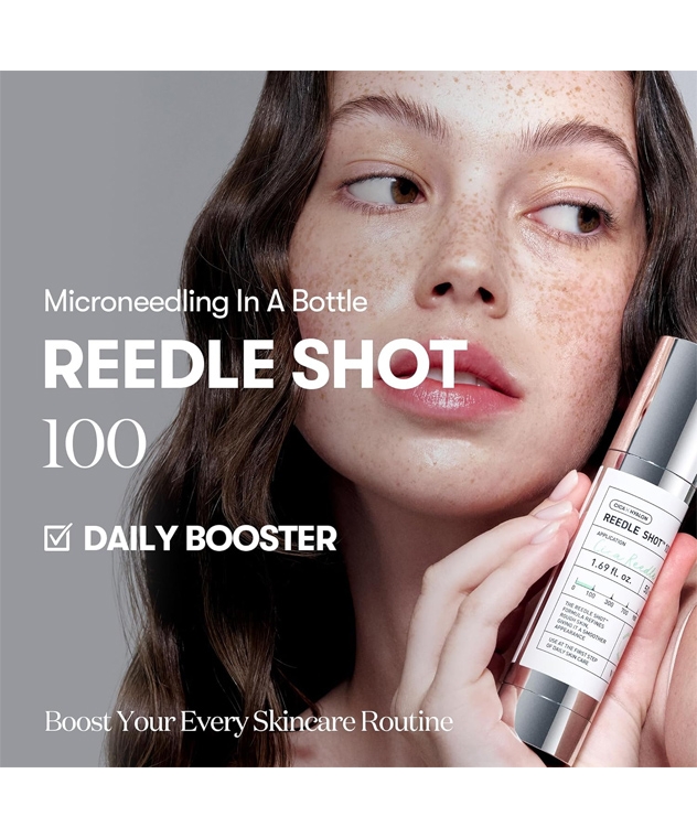 VT Reedle Shot 100 daily booster serum on model holding bottle