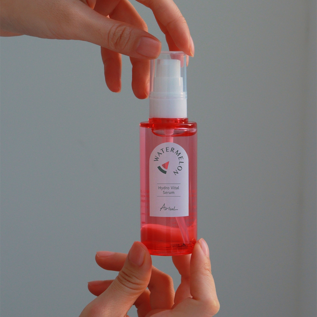 Ariul Watermelon Hydro Vital Serum 55ml pump bottle held in hands